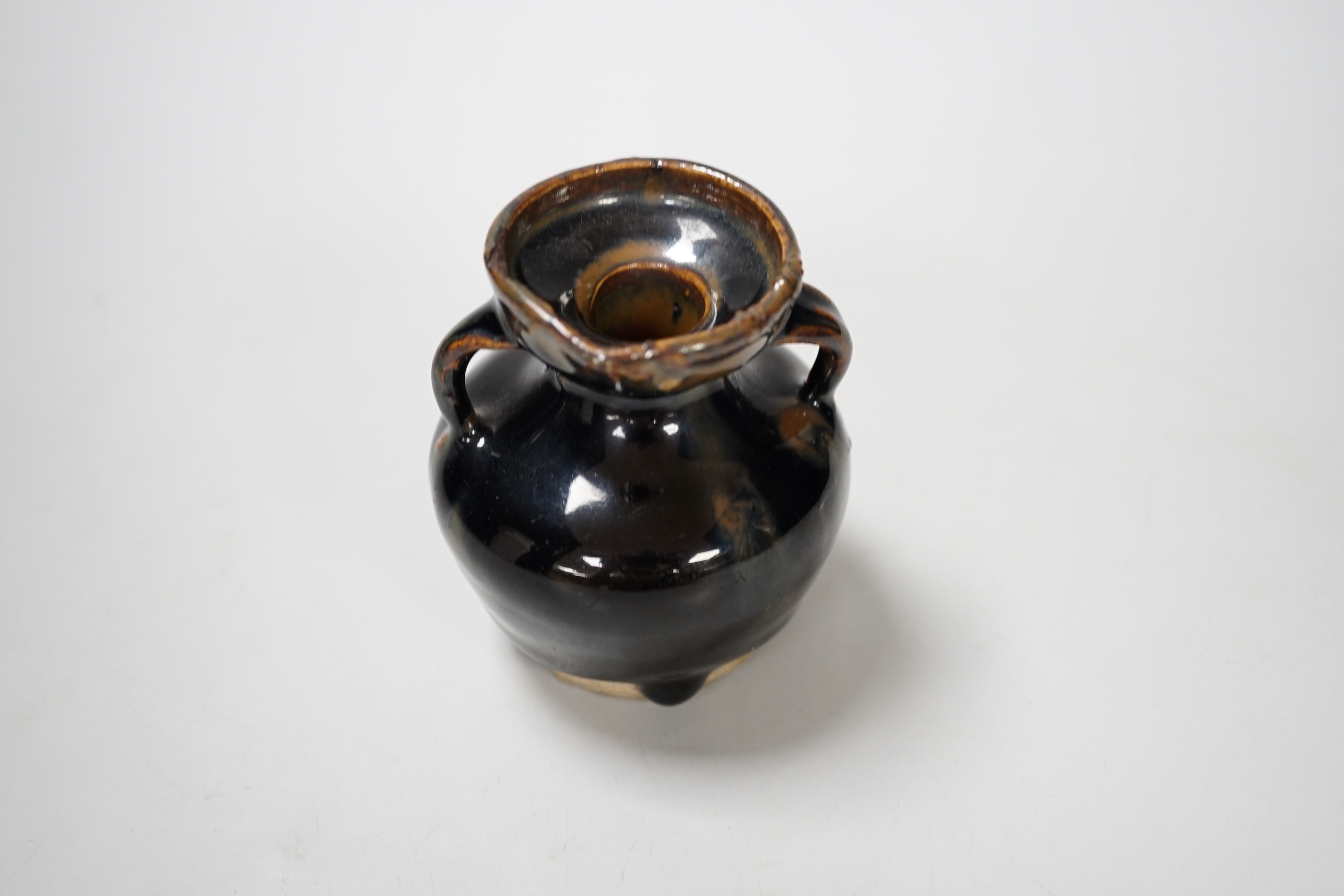 A Chinese Jian type two handled jar, possibly Song dynasty, 8cm high